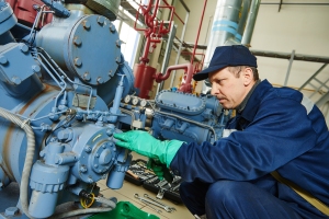 service engineer worker at industrial compressor refrigeration s